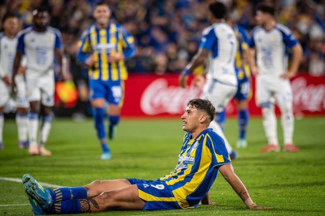 Escudo de Rosario Central sobre fondo blanco